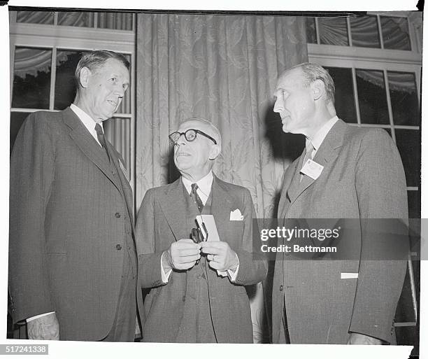 Members of the governing boards of the World Bank and International Monetary Funds opened their 9th annual meeting. Talking during a recess are, left...