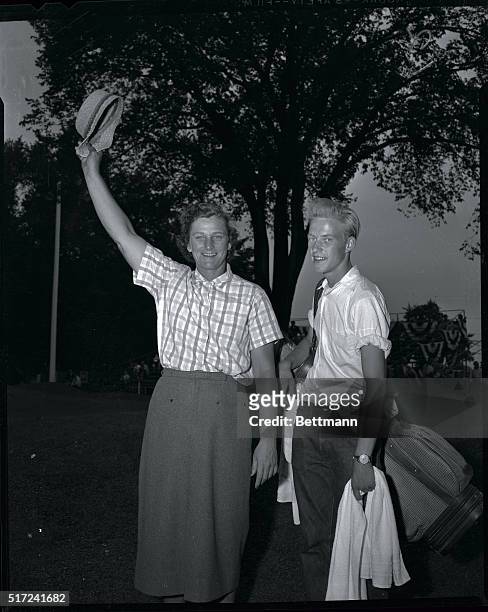 Babe Zaharias, golf's famed comeback gal, waves her hat gleefully after winning her fifth All-American tourney at the Tam O'Shanter Golf Course in...