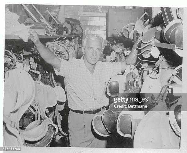 Penn State football coach Rip Engle makes an equipment check on the eve of pre-season football drills at the college. Seventeen Lettermen are...