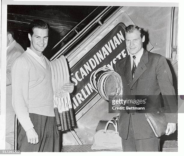 Sven Davidson and Lennart Bergelin, members of the Swedish Davis Cup team, arrive in New York from Stockholm. They will play in the U.S. Championship...