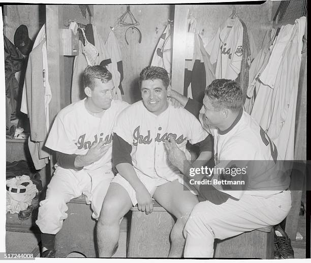 The "big three" of the Cleveland Indians' pitching staff hoop it up in their dressing room after Mike Garcia notched his 11th win of the year by...