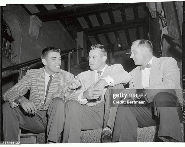 Three of the Philadelphia Phillies, in town for a scheduled game with the Dodgers, hope to sit out the rain but with no success, the game was called....