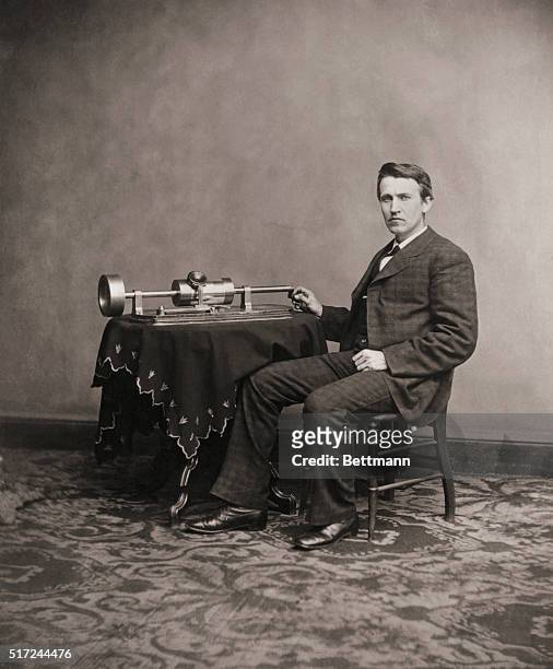 Thomas Edison and his phonograph in an undated photograph.