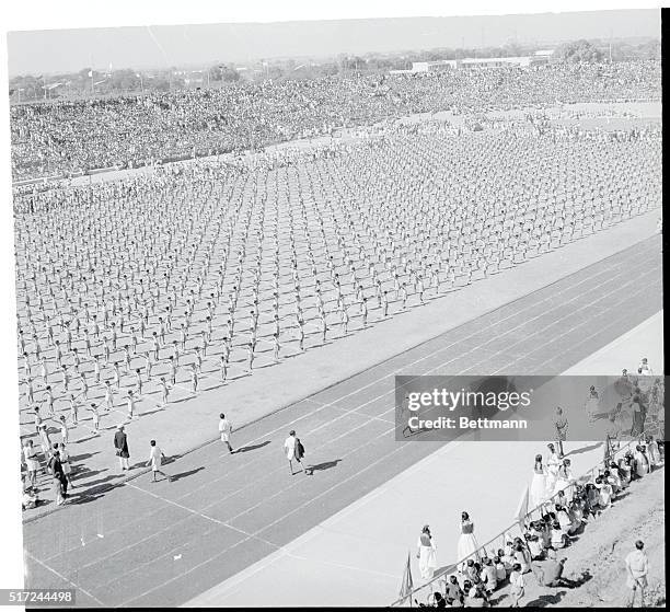 More than 2,000 children form a far-reaching pattern of neatness and precision in the stadium at New Delhi, in a special drill ceremony marking the...