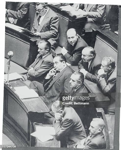 French Premier Pierre Mendes-France sits with his ministers during a debate in the National Assembly. The Premier won a vote on confidence on his...
