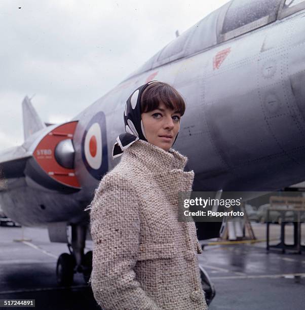 Actress Wendy Gifford in front of the Scott-Furlong Predator VTOL aircraft from the television series 'The Plane Makers' in 1964.