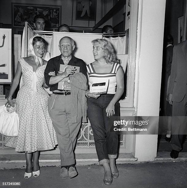 Portrait of the Artist. Cannes, France: Attending a Cannes art show, artist Pablo Picasso shares the spotlight with French actress Vera Clouzot and...