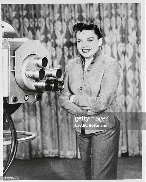 Judy Garland gets her first close look at a television camera as she prepares for her television debut on a CBS Ford Star Jubilee program September...