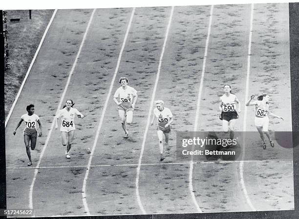 Canadian girl winning 100 meter heat in Olympiad. London, England: Canada had its brief moment of triumph in the women's 100 meter competition when...