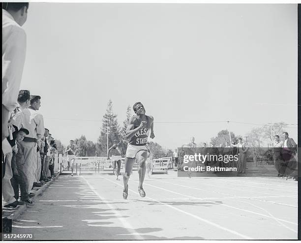 Ancel Robinson of Fresno State leaves all competition behind as he sets a new track and meet record against San Jose State in the 120-yard high...