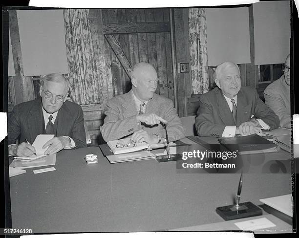 Camp David, Maryland. A serious faced President Eisenhower makes a point as he poses just before meeting with his cabinet here .