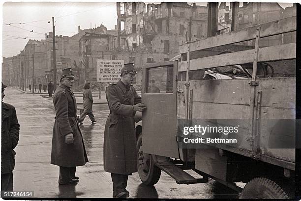 Berlin, Germany- Stumm police, on orders from the allied kommandatura, check through vehicles for industrial equipment at sector boundaries here. The...