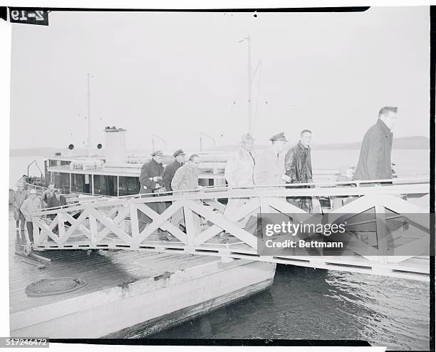 Fast Exit. Steilacoom, Washington: Former big time Los Angeles gambler Mickey Cohen leaves McNeil Island federal penitentiary near Steilacoom. Man at...