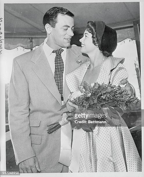 John Ireland and Joanne Dru of the movies made headlines when this photo was made in 1949. They had just been married, shortly after Miss Dru's...