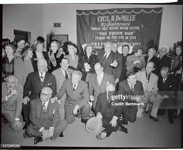 Scores of screen notables gathered at the scene of filming of first feature-length movie, The Squaw Man, By Cecil B. Demille in 1914 to help Demille...