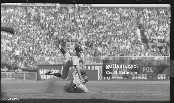 Keystone Ballet. New York: With the grace and agility of a ballet dancer, Yankee second baseman Gerry Coleman leaps high in the air and kicks to...