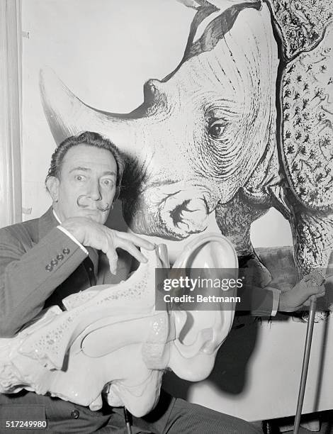 Famous surrealist painter Salvador Dali unveiled, February 21st, at the Hotel St. Regis here, his new magazine which is to be called Rhinoceros. Dali...