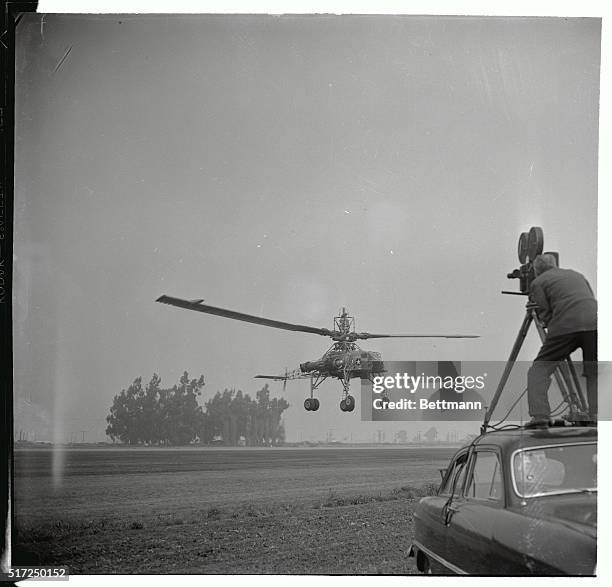 The world's largest helicopter, Howard Hughes' big XH-17, makes its first public appearance in Culver City. The 36-foot-high craft, with rotor blades...