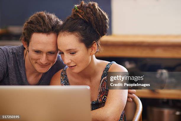 surfing the net - peopleimages stock pictures, royalty-free photos & images