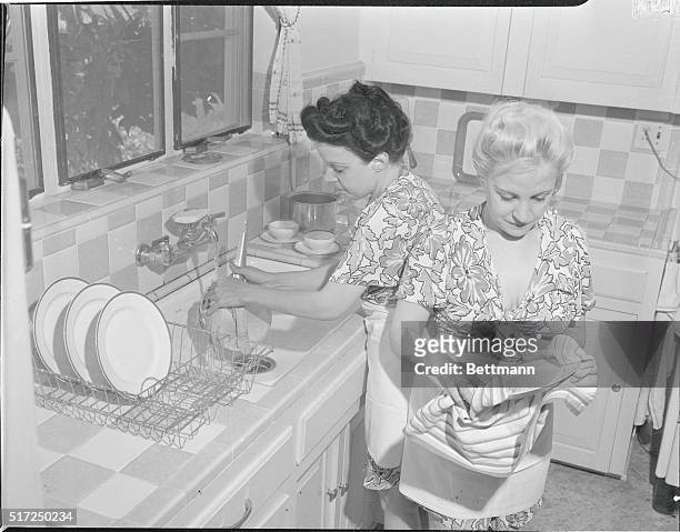Sister Act. The Siamese twin arrangement is a swell team for washing and drying the dishes. Violet and Daisy Hilton were born in England, brought to...