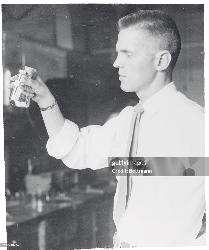 Dr. Jay Barton II Holding Specimen