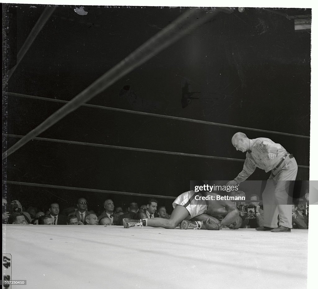 Jersey Joe Walcott Being Counted out in Boxing Ring