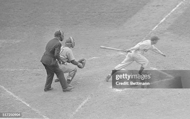 Brooklyn, New York: CLyde Sukeforrth, Dodgers' catcher, is shown at bat during double header at Ebbets Field today between the Dodgers and Chicago...