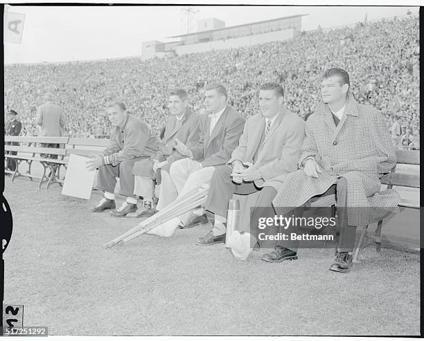 With the list of injuries reading like a "Who's Who" of Professional Football, the above members of the San Francisco 49ers ride the bench during the...