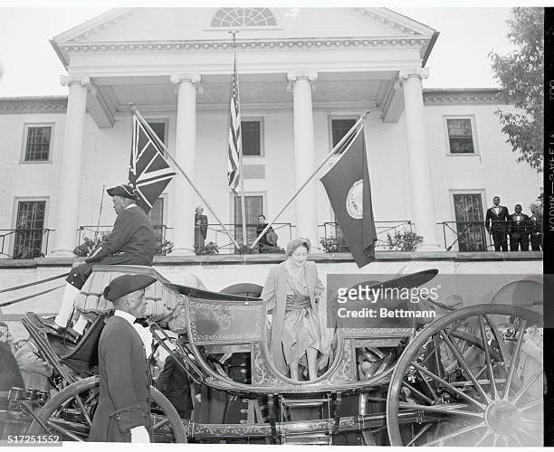 Queen Mother Elizabeth enters a colonial-style carriage as she prepares for a trip through historic Williamsburg, November 11th. The Queen Mother,...