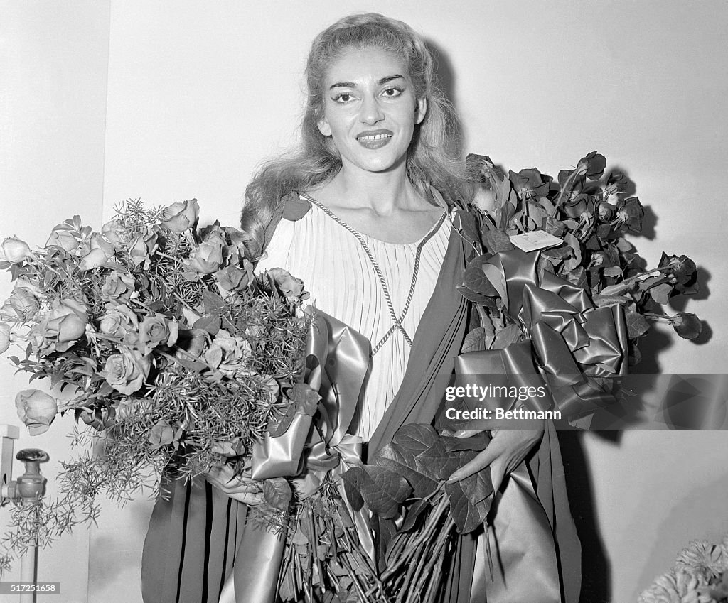 Opera Singer Maria Callas Holding Two Large Bouquets