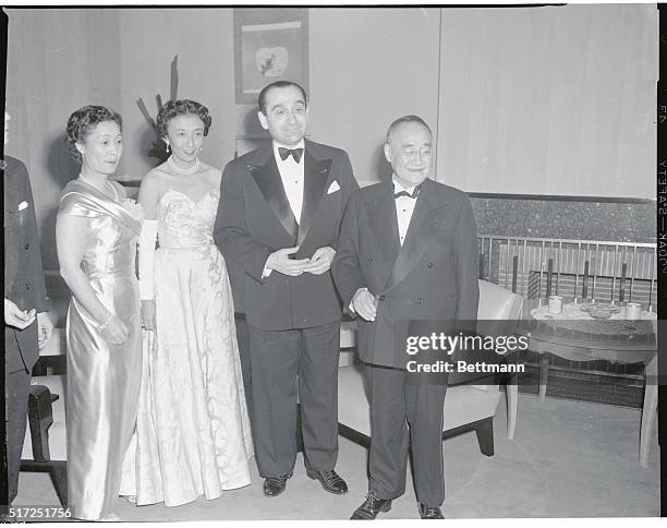 Together at a reception in the Japanese Embassy in Paris are, : Japanese Prime Minister Shigeru Yoshida, French Premier Pierre Mendes-France and...