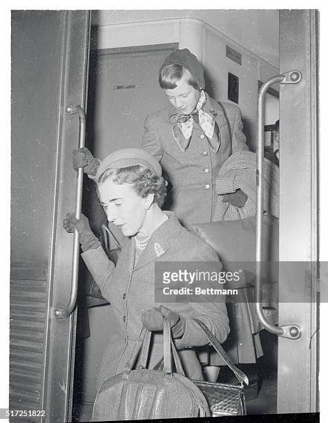 Denmark's Queen Ingrid, and her daughter, Princess Margrethe, step from a train in Paris for a few days visit. The Queen was scheduled to go on to...