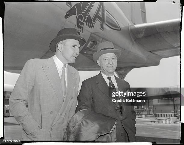 Butler, right, Britain's Chancellor of the Exchequer, arrives at Washington Airport to head his country's delegation to the forthcoming World Bank...