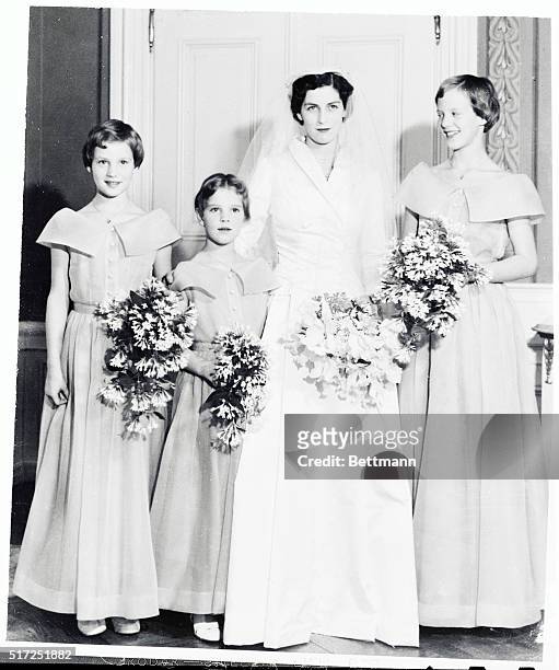 The three Danish princesses acted as bridesmaids when their British governess, Mary North, was married in 1954 to Mogens Hartung. At the ceremony in...