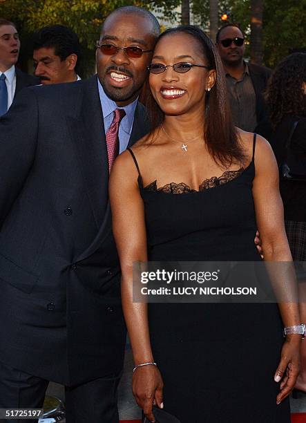 Actress Angela Bassett arrives at the premiere of her new film "The Score" with her husband actor Courtney Vance, 09 July 2001, in Hollywood, CA. AFP...