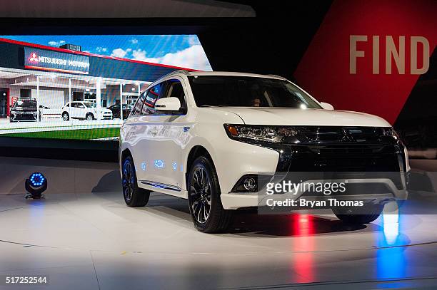 The new Mitsubishi Outlander PHEV is introduced at the New York International Auto Show at the Javits Center on March 24, 2016 in New York City....