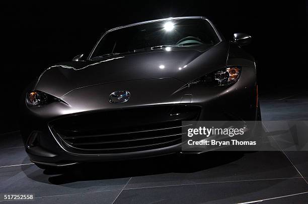 The Mazda MX-5 RF is introduced at the New York International Auto Show at the Javits Center on March 24, 2016 in New York City. President of Mazda...