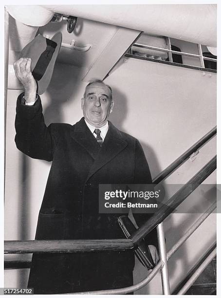 New York: Moses Headed For Spain. New York's Commissioner of Parks, Robert Moses waves his hat in farewell as he leaves for Europe aboard the...
