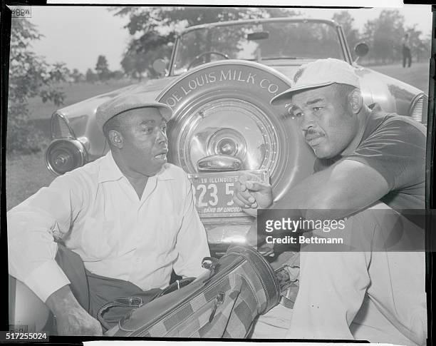 Riverdale, Illinois; Former heavyweight boxing champ Joe Louis is shown with business partner Jess Thornton at the Pipe Peace golf course here,...