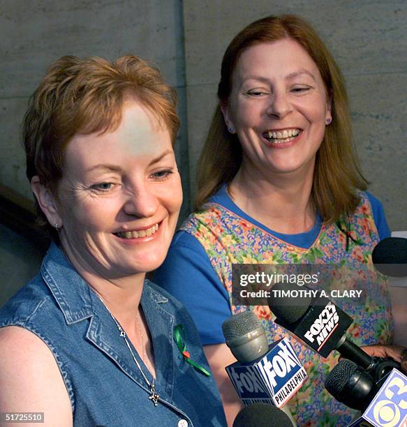 Buffy Hall and Meg Wakeman , the sisters of Holly Maddux talk to the press as they arrive at the 30th Street Station in Philadelphia , PA, 20 July...