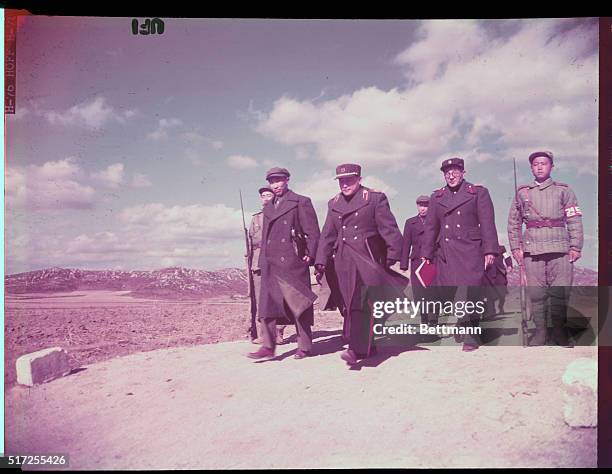 Panmunjom, Korea: Left: Gen. Hsieh Fung and Gen. Lee Sang Cho were leaving the conference tent after morning armistice sessions had ended.