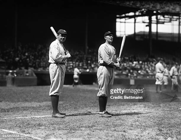 Babe Ruth and Ty Cobb, two of the American League's heaviest hitters, stand together during pregame exercises at the Polo Grounds.