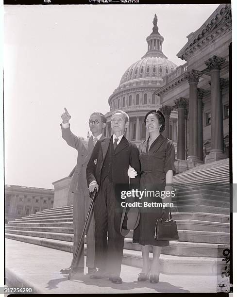 Washington, DC: Yukeo Ozaki, center, 92-year old Japanese Diet member, who donated the cherry trees that frame Washington's tidal basin 45 years ago,...