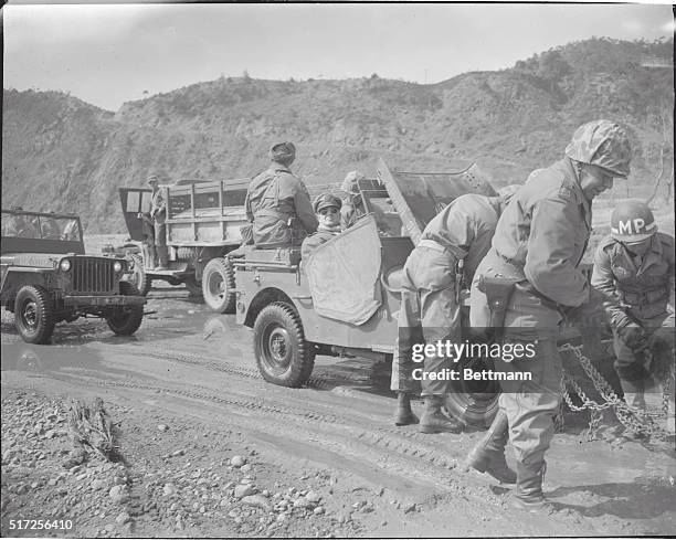 Korea: MacArthur Sits It Out....General Douglas MacArthur's jeep broke down while making a run over the Korean fighting area, and the General is...