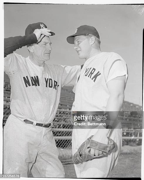 "Now what am I going to do with you, son", says Casey Stengel to Jackie Jensen who reported to the New York Yankees' spring raining camp at Phoenix,...
