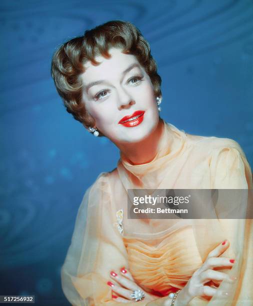 Actress Rosalind Russell plays the part of Auntie Mame directed by Morton Da Costa for Warner Brothers for the 1958 film of the same title.