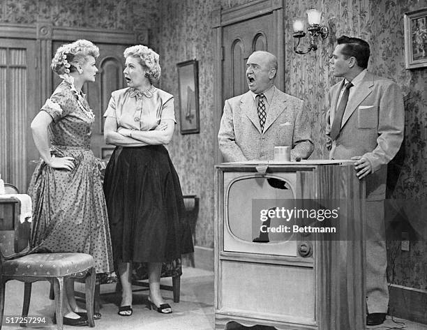 Battling foursome consists of Lucille Ball, Vivian Vance, William Frawley and Desi Arnaz. In this sequence, "Ricky" short-circuits the television set...
