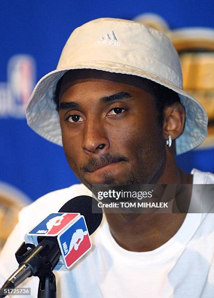 Los Angeles Lakers' guard Kobe Bryant listens to a reporter's question during a press conference prior to the team's practice in Philadelphia, PA, 11...