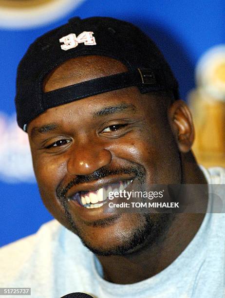 Los Angeles Lakers' center Shaquille O'Neal answers a reporters question during a press conference prior to the team's practice in Philadelphia 11...