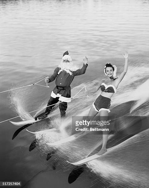 This Santa Claus helper has left Rudolph the Red-Nosed Reindeer and his sleigh up north and has taken to water skiing at Cypress Gardens, Florida. He...